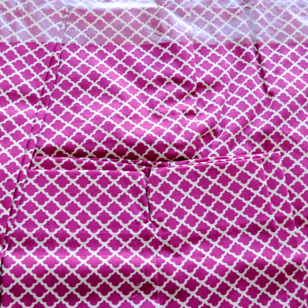 Flattering classic side zip pant with with lattice design in fuchsia and white